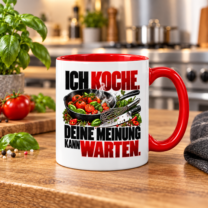 Rote Koch-Tasse mit Küchenmotiv auf einer Küchenarbeitsplatte