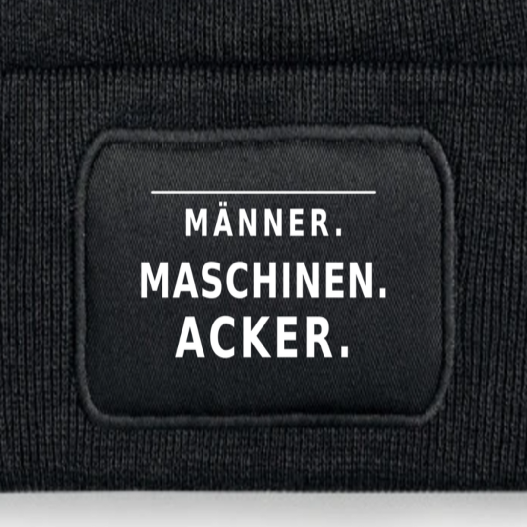 Detailansicht des Patches MÄNNER MASCHINEN ACKER