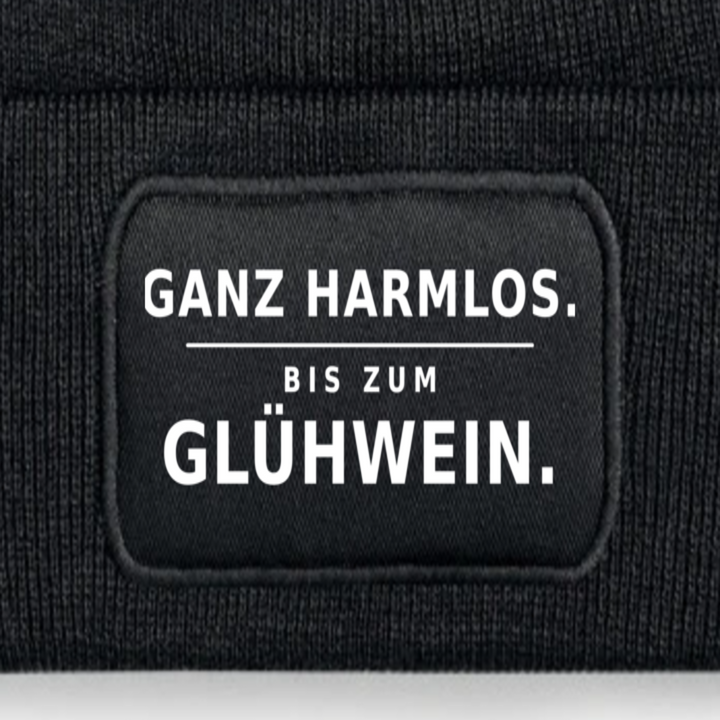 Detailansicht des Druckmotivs GANZ HARMLOS. BIS ZUM GLÜHWEIN.