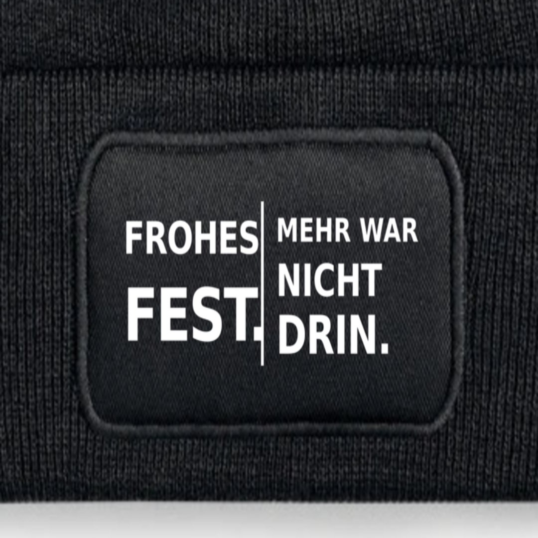 Detailansicht des Aufdrucks FROHES FEST. MEHR WAR NICHT DRIN.