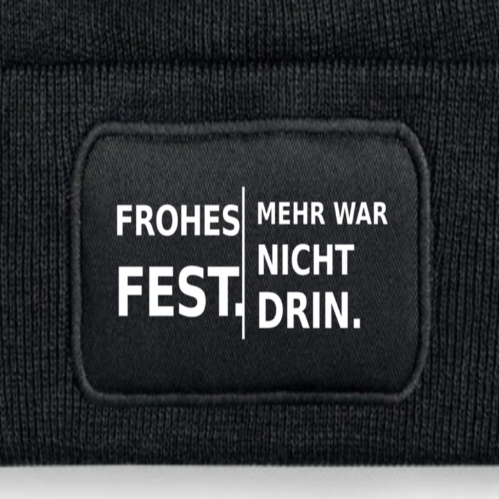 Detailansicht des Aufdrucks FROHES FEST. MEHR WAR NICHT DRIN.