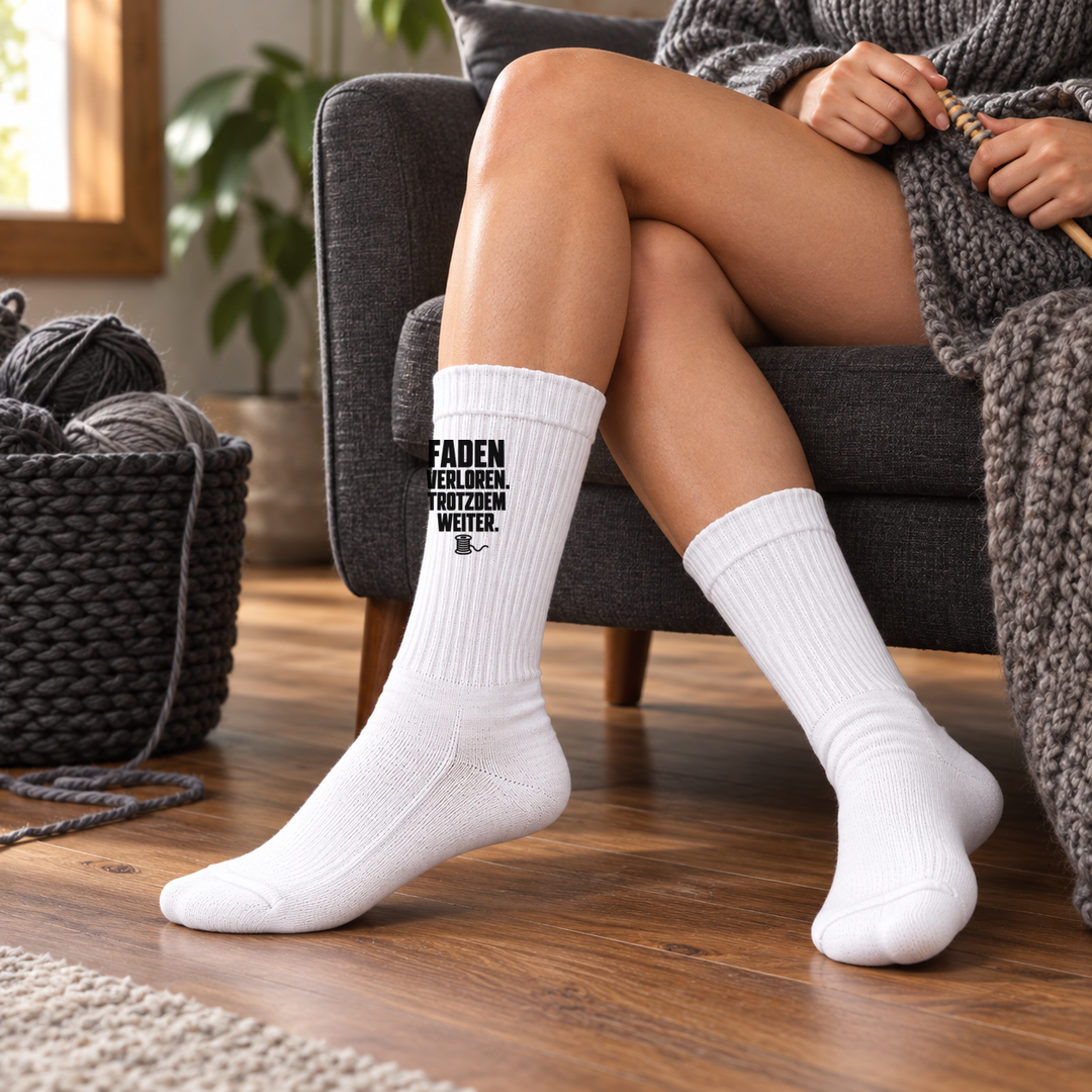 Strick-Lifestyle mit weißer Faden-verloren-Socke