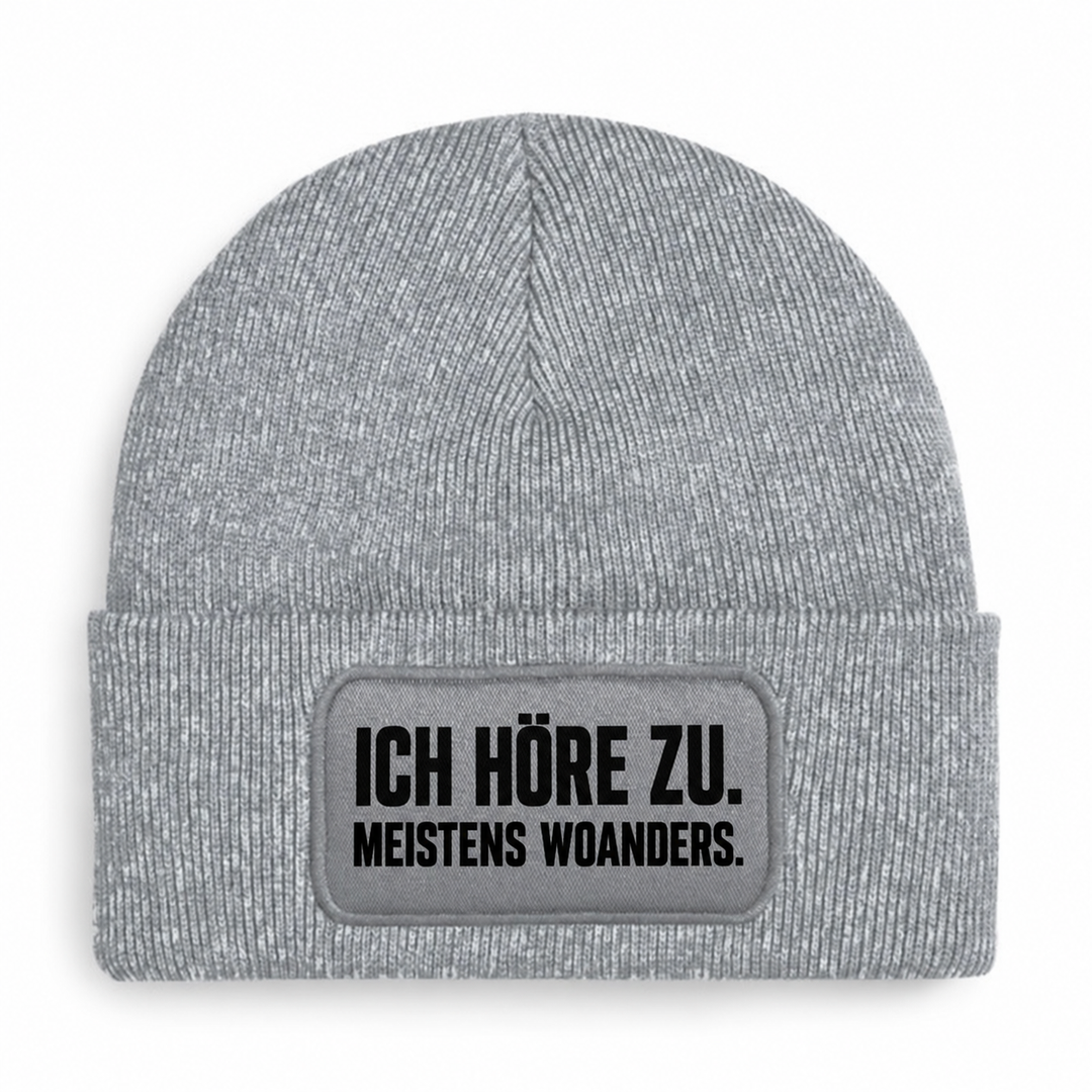 PEPAM Mütze „ICH HÖRE ZU. MEISTENS WOANDERS.“ – Grau