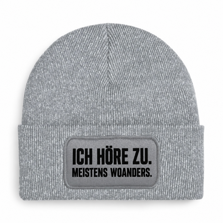 PEPAM Mütze „ICH HÖRE ZU. MEISTENS WOANDERS.“ – Grau