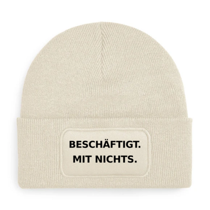 Beige PEPAM Mütze mit Spruch BESCHÄFTIGT. MIT NICHTS.