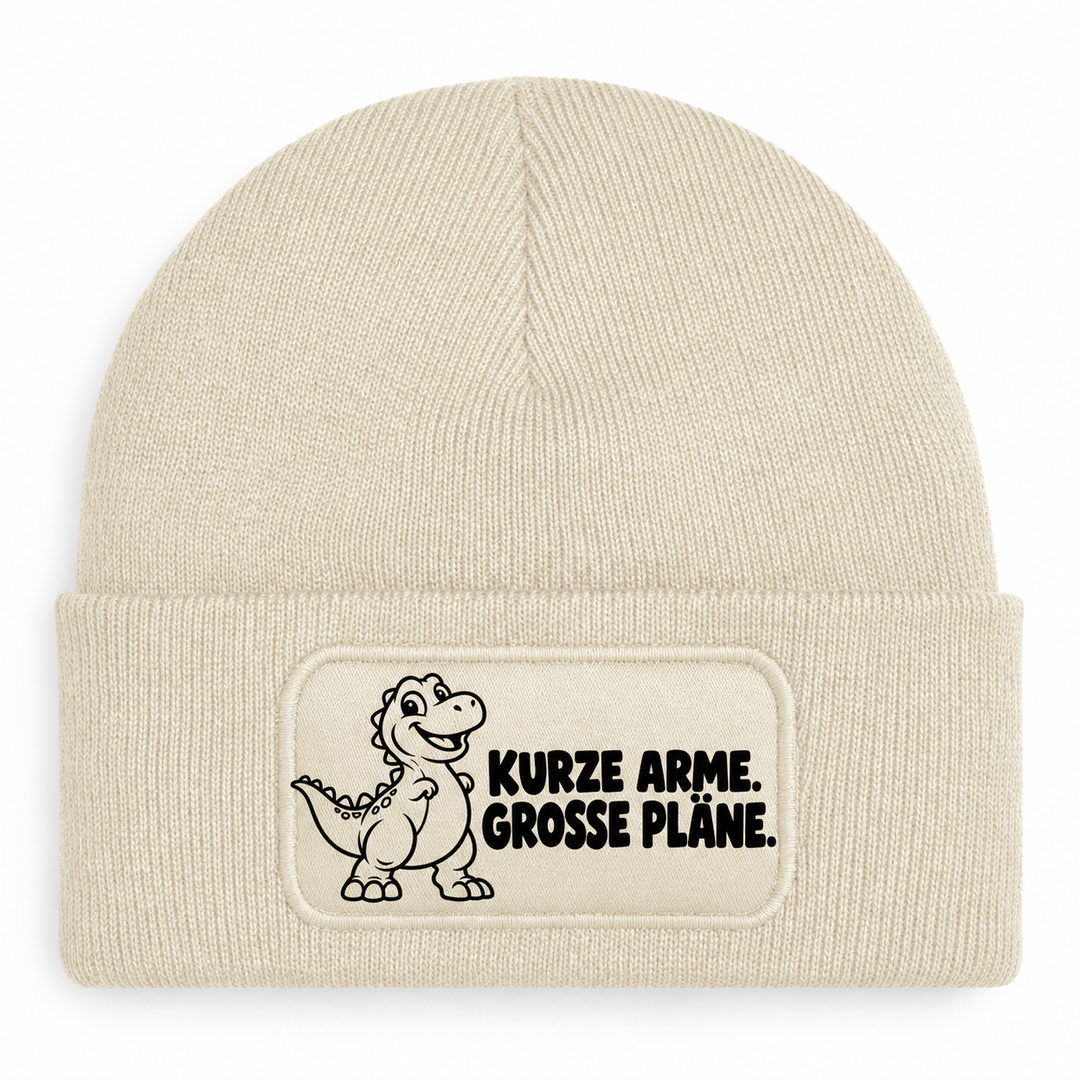 Mütze Beige mit Comic-Dinosaurier – KURZE ARME. GROSSE PLÄNE.