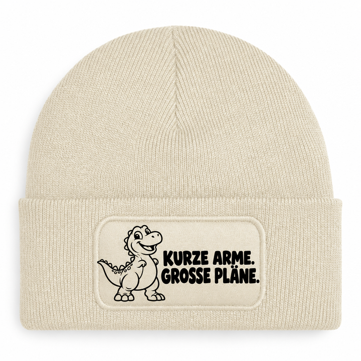 Mütze Beige mit Comic-Dinosaurier – KURZE ARME. GROSSE PLÄNE.