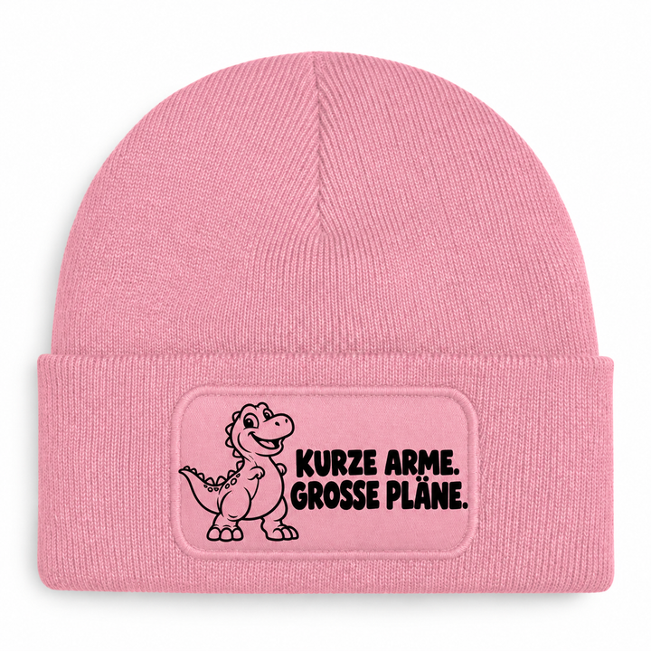 Mütze Rosa mit Comic-Dinosaurier – KURZE ARME. GROSSE PLÄNE.