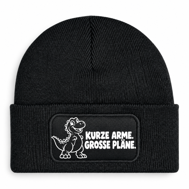 Mütze Schwarz mit Comic-Dinosaurier – KURZE ARME. GROSSE PLÄNE.