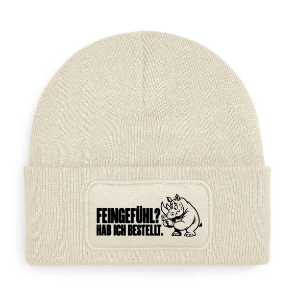 Mütze FEINGEFÜHL? HAB ICH BESTELLT. mit Comic-Nashorn in Beige