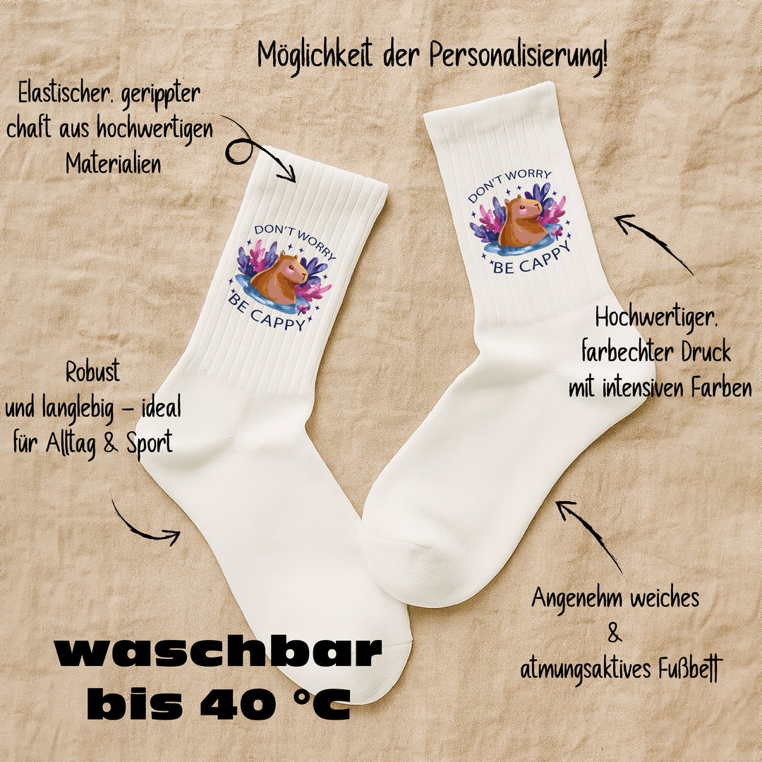 Socken „Don’t worry, be cappy“ – Lustige Capybara-Socken | Funny Animal Socks | Gute-Laune-Motiv aus Bio-Baumwolle