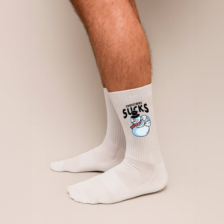 Socken „Christmas Sucks“ – Lustige Anti-Weihnachten Socken | Witzige Spruchsocken | Geschenk für Grinchs & Weihnachtsmuffel